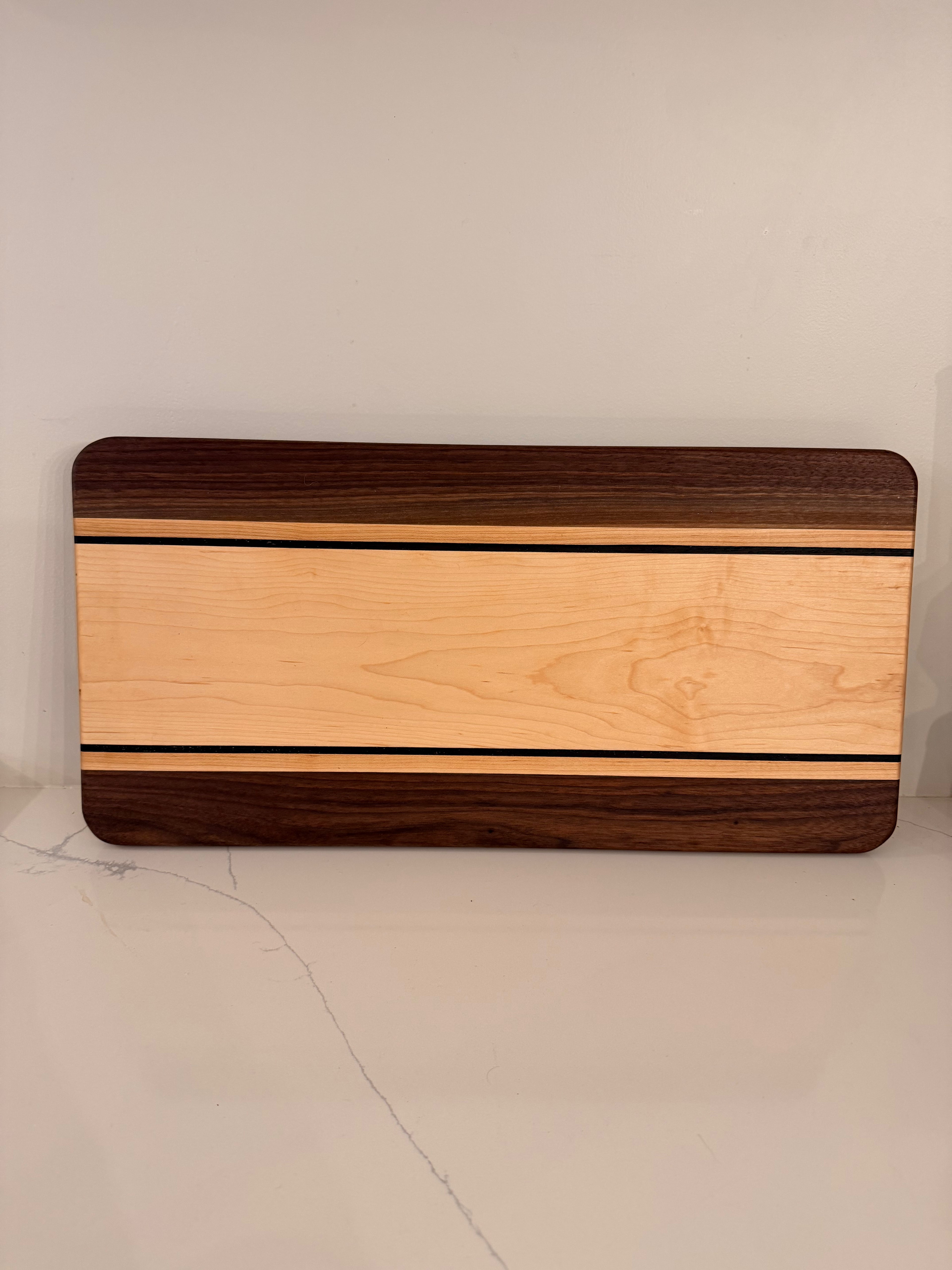 Raised serving board
