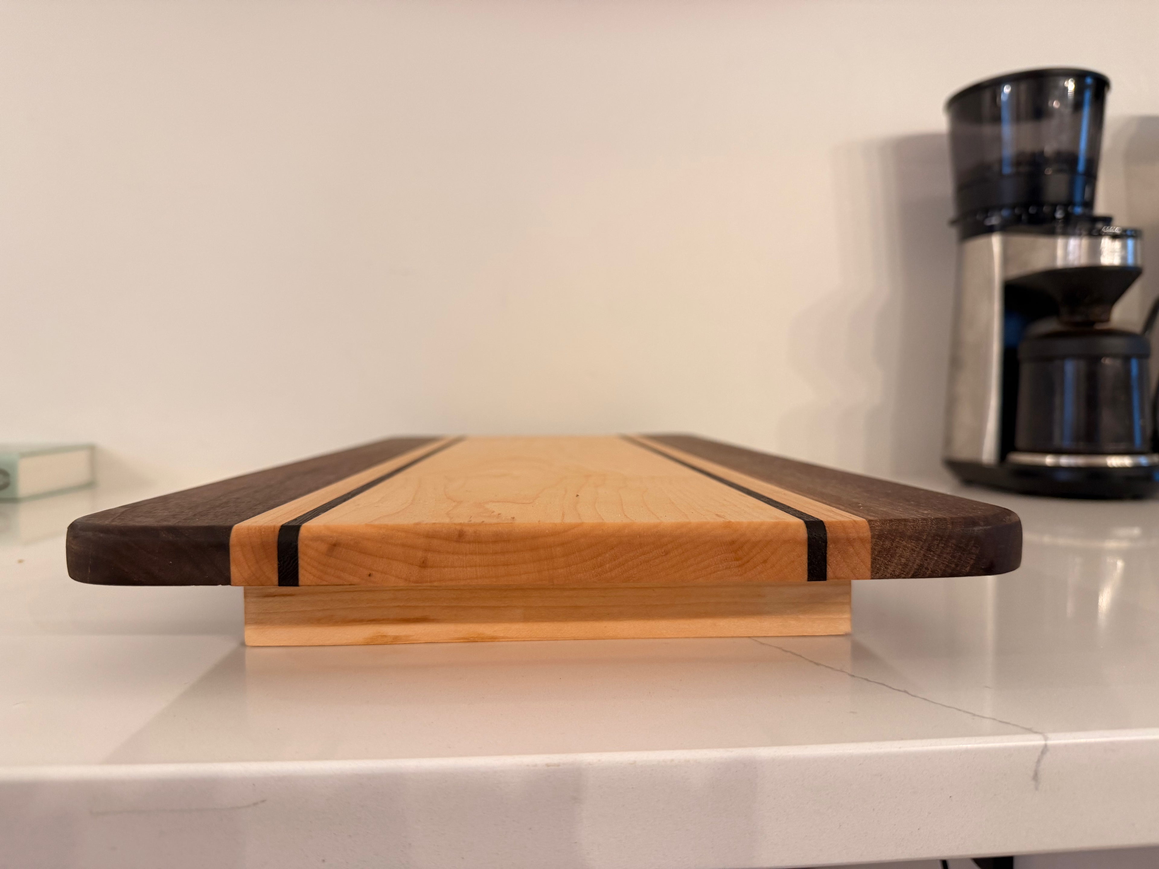 Raised serving board