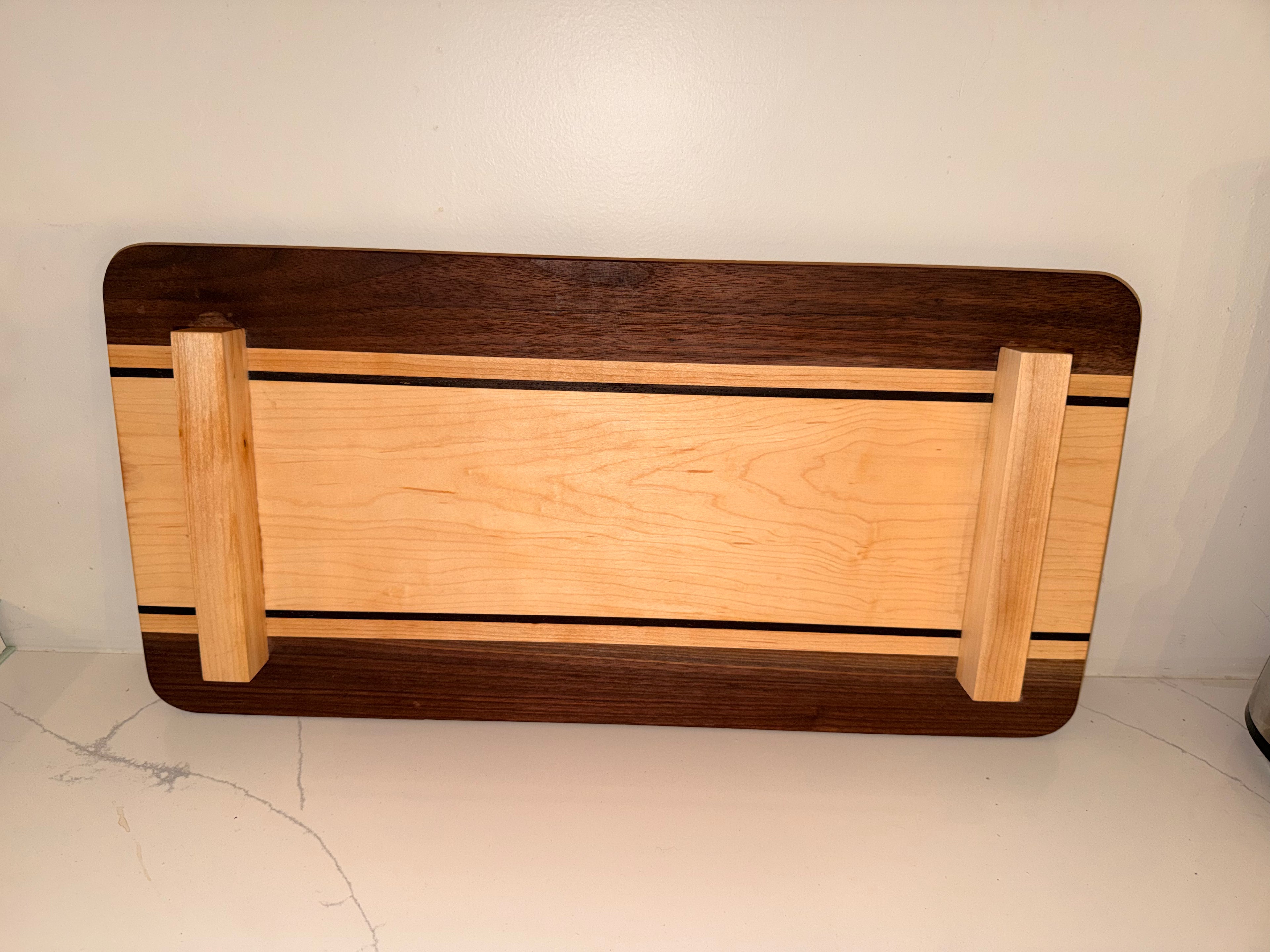 Raised serving board